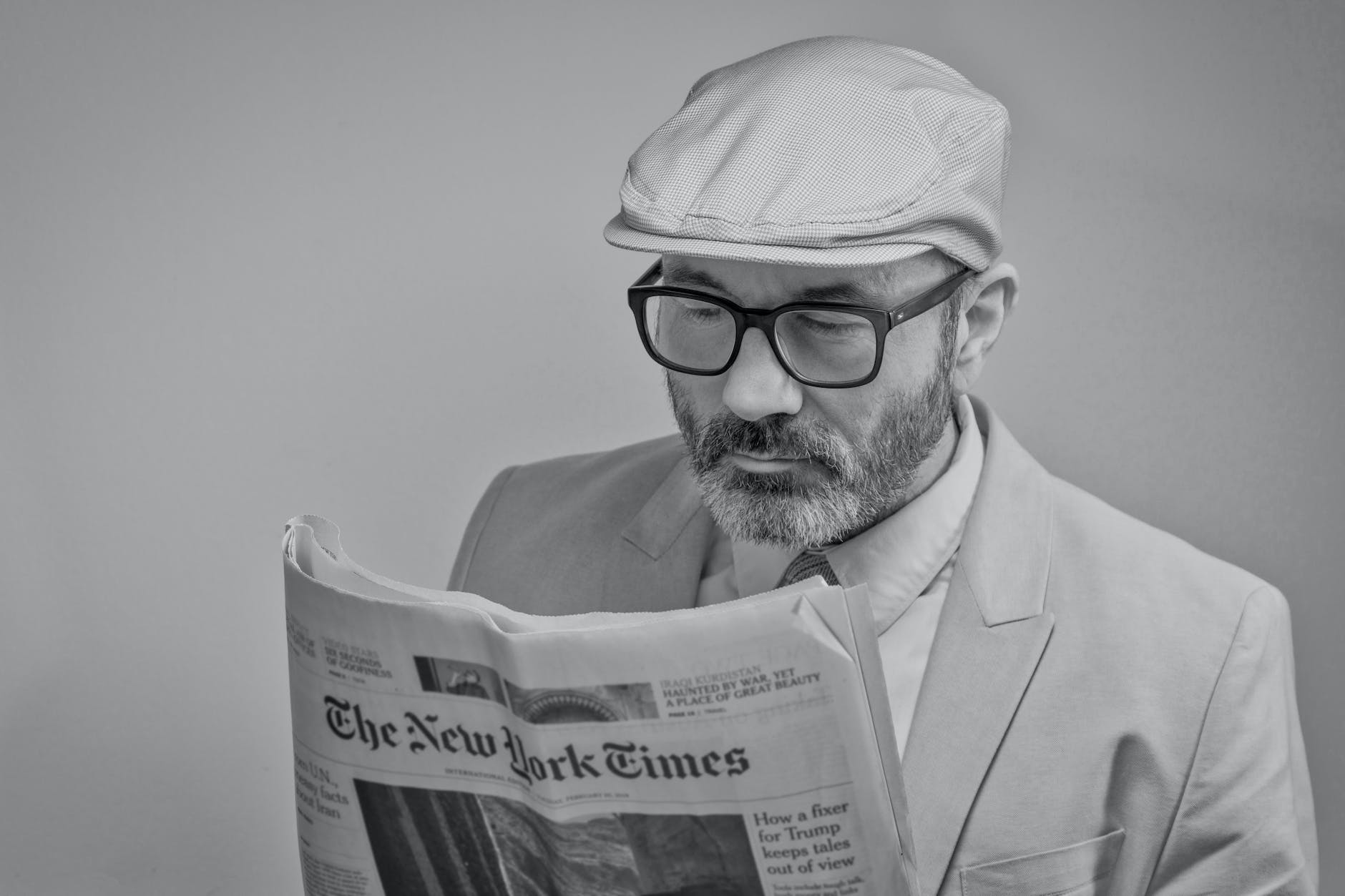 man reading a newspaper
